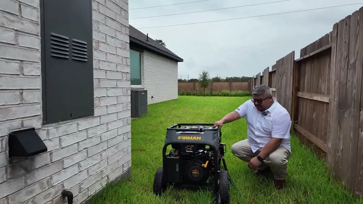 Pro Max Electrical crouched beside a Firman portable generator in a side yard